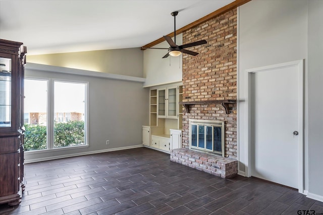 unfurnished living room featuring dark wood-type flooring, high vaulted ceiling, ceiling fan, and a brick fireplace