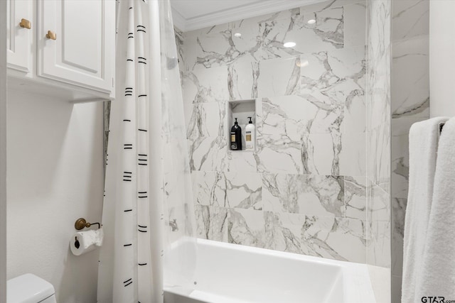 bathroom featuring toilet, ornamental molding, and shower / bath combo