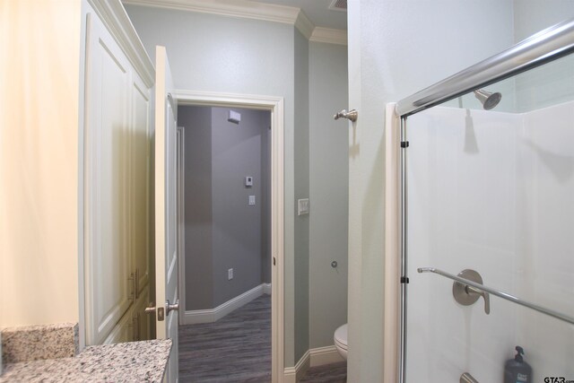 1700 Easy St, Tyler, TX 75703 - full bath with a shower stall, ornamental molding, wood finished floors, and vanity