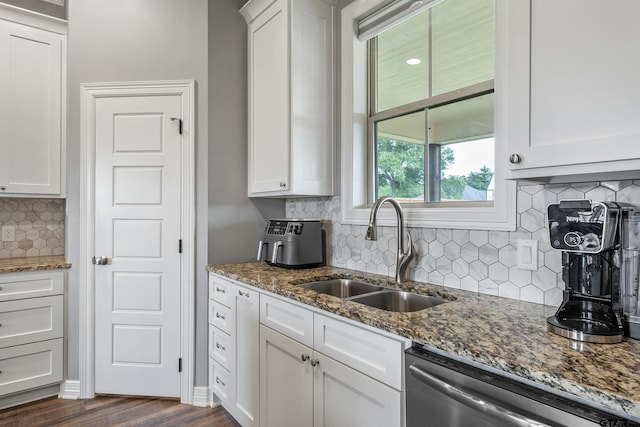 7757 Freestone Dr, Bullard, TX 75757 - kitchen with stainless steel dishwasher, backsplash, and white cabinets