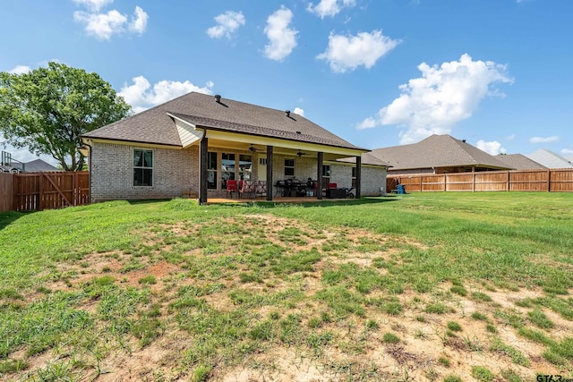 7757 Freestone Dr, Bullard, TX 75757 - rear view of property with a fenced backyard, a patio area, ceiling fan, brick siding, and roof with shingles