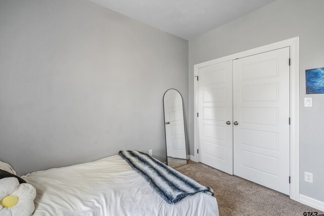 7757 Freestone Dr, Bullard, TX 75757 - bedroom featuring carpet flooring and a closet