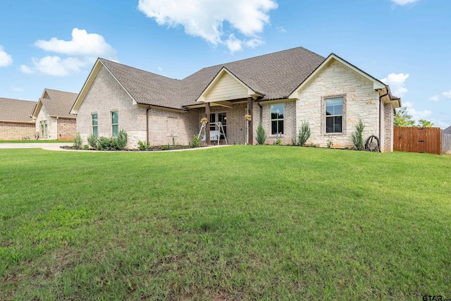 7757 Freestone Dr, Bullard, TX 75757 - view of front of home featuring roof with shingles and stone siding