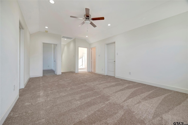 unfurnished bedroom with light carpet, baseboards, visible vents, lofted ceiling, and recessed lighting