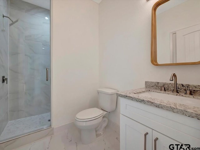 bathroom with toilet, marble finish floor, and a shower stall