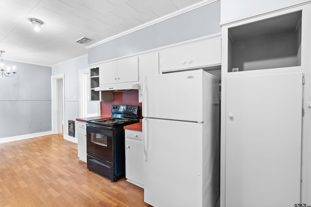 kitchen with freestanding refrigerator, visible vents, crown molding, white cabinetry, and electric range