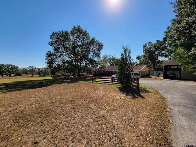 view of yard with a carport