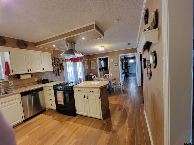 kitchen featuring kitchen peninsula, stainless steel dishwasher, light hardwood / wood-style flooring, island exhaust hood, and black electric range oven