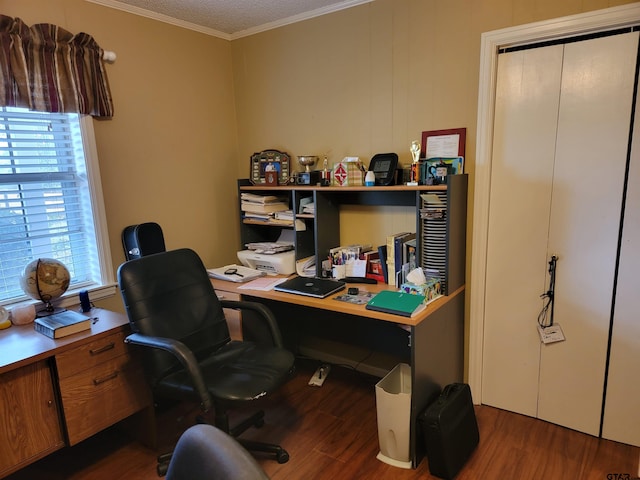 office area featuring dark wood-type flooring, a textured ceiling, and crown molding