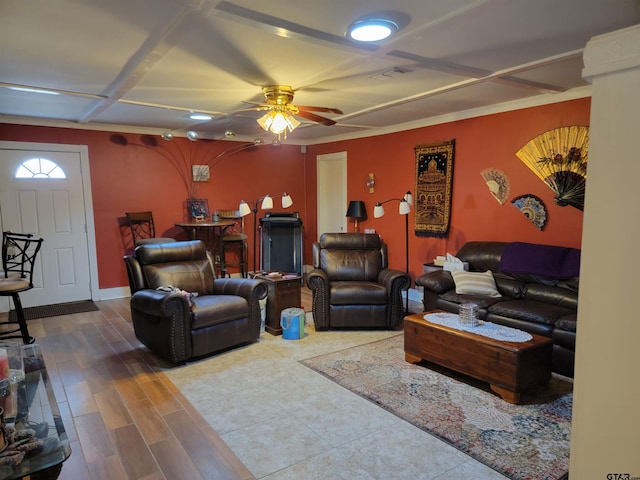 living room with hardwood / wood-style floors and ceiling fan