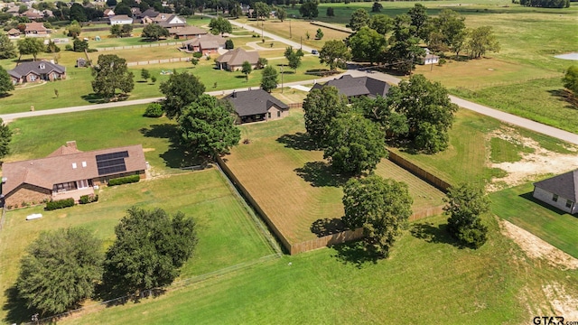 birds eye view of property featuring a rural view