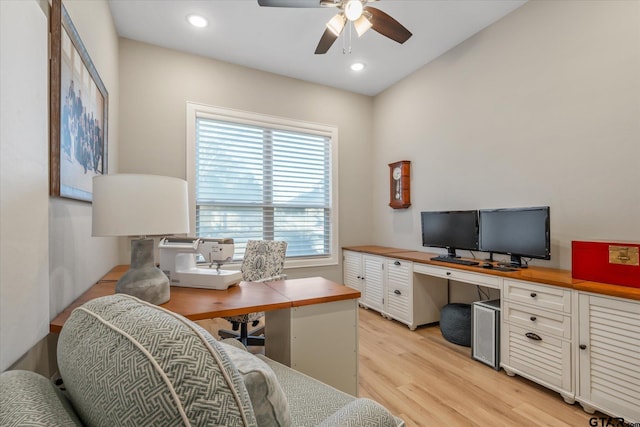 office area with recessed lighting, a ceiling fan, light wood finished floors, and built in study area