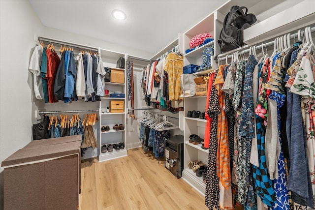 spacious closet with wood finished floors