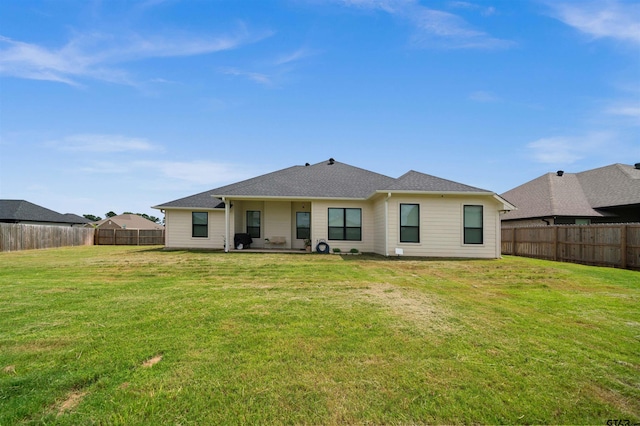 409 Meadow Ln, Chandler, TX 75758 - back of house featuring a fenced backyard and a patio area