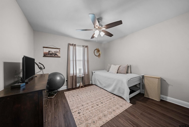 409 Meadow Ln, Chandler, TX 75758 - bedroom with dark wood-style flooring and ceiling fan