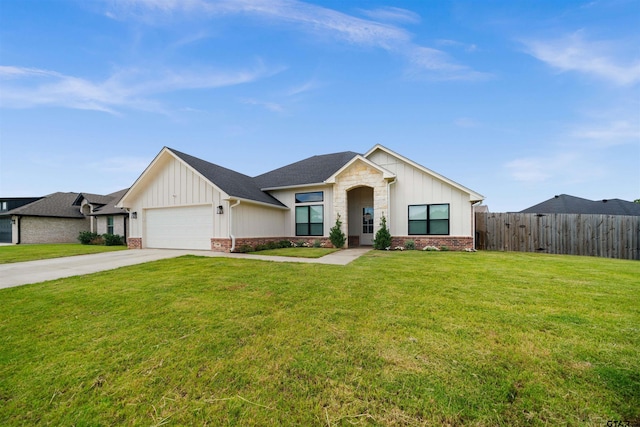 409 Meadow Ln, Chandler, TX 75758 - view of front of home with board and batten siding, concrete driveway, and an attached garage