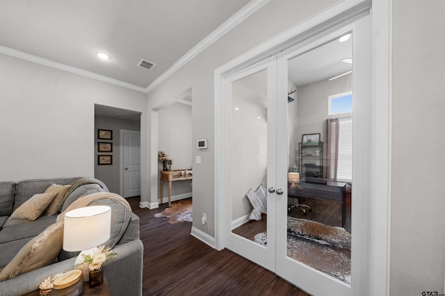 409 Meadow Ln, Chandler, TX 75758 - living area featuring french doors, wood finished floors, ornamental molding, and recessed lighting
