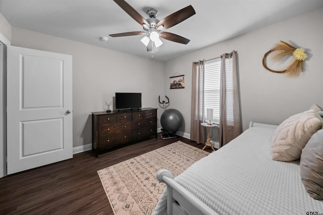 409 Meadow Ln, Chandler, TX 75758 - bedroom with dark wood finished floors and a ceiling fan