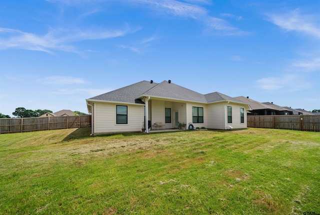 409 Meadow Ln, Chandler, TX 75758 - back of property with a fenced backyard and a patio area