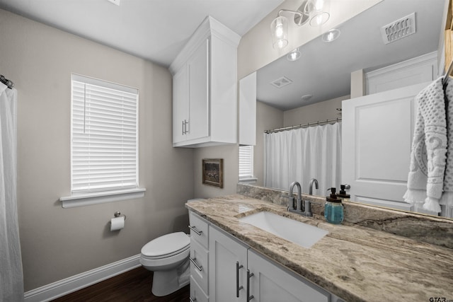 409 Meadow Ln, Chandler, TX 75758 - bathroom featuring vanity, wood finished floors, and a shower with curtain
