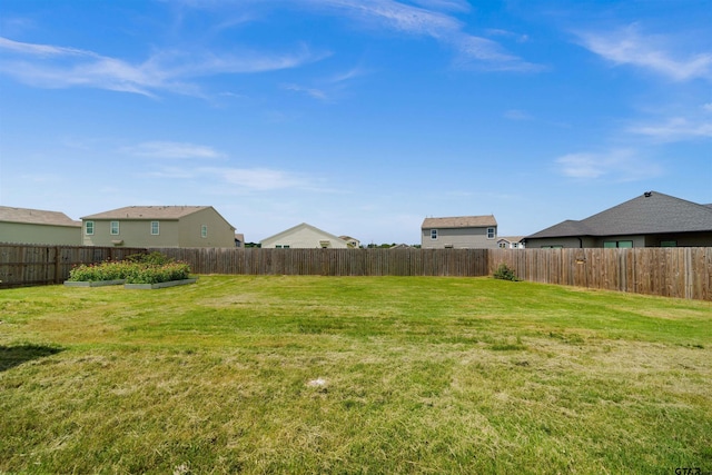 409 Meadow Ln, Chandler, TX 75758 - fenced backyard featuring a vegetable garden