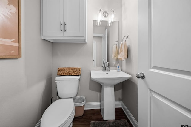 409 Meadow Ln, Chandler, TX 75758 - bathroom featuring toilet and wood finished floors