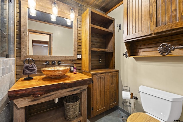 bathroom with toilet and a sink