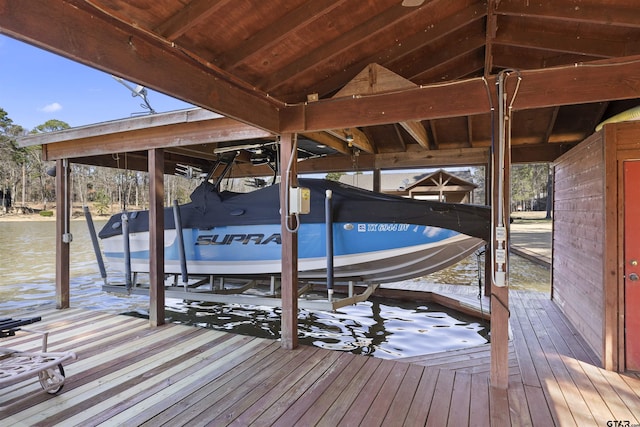 view of dock featuring boat lift