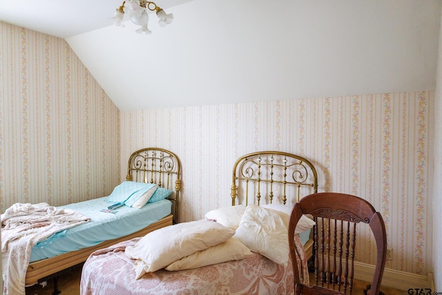 bedroom with vaulted ceiling