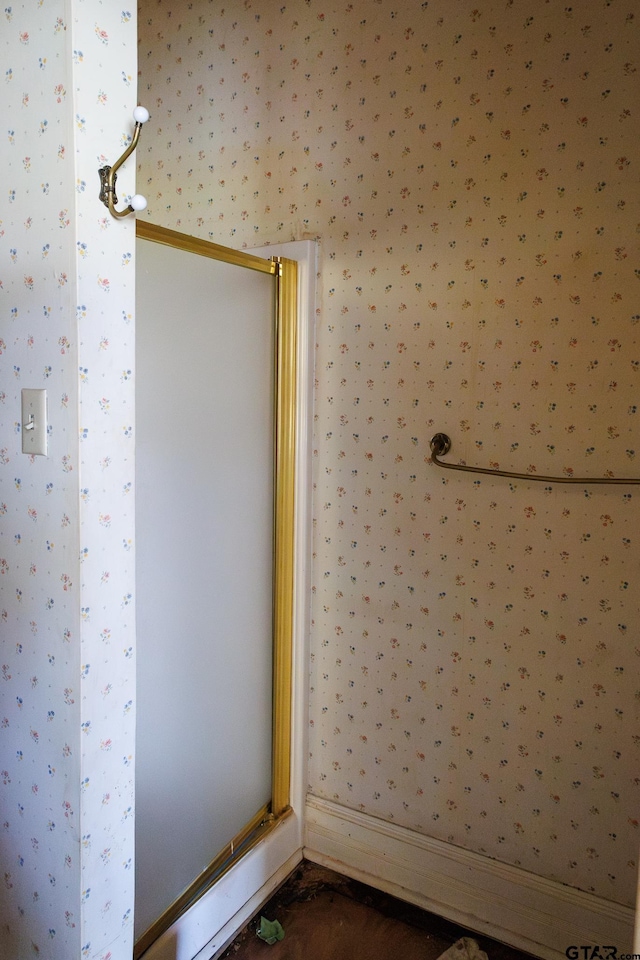 interior space featuring walk in shower