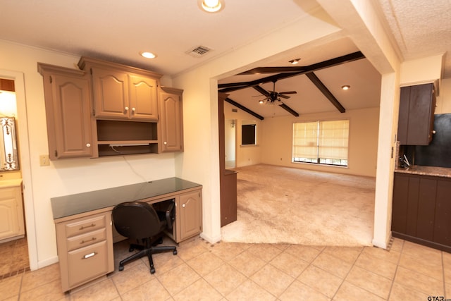 office space with vaulted ceiling with beams, ceiling fan, crown molding, and light carpet