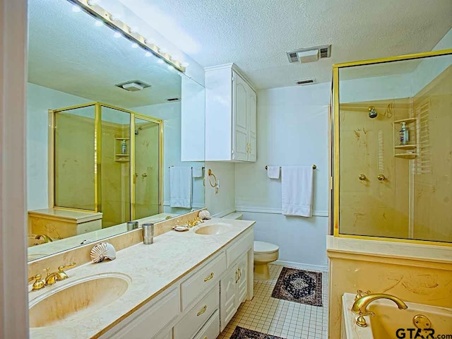 full bathroom with tile patterned flooring, a textured ceiling, vanity, plus walk in shower, and toilet