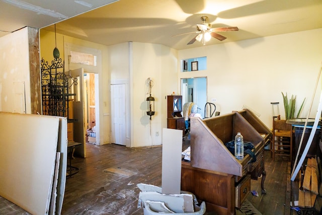 interior space featuring ceiling fan and dark hardwood / wood-style flooring