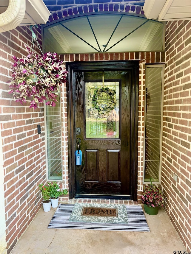 1625 Skidmore Ln, Tyler, TX 75703 - doorway to property featuring brick siding