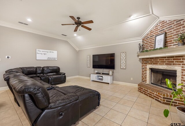1625 Skidmore Ln, Tyler, TX 75703 - living room with lofted ceiling, light tile patterned flooring, ceiling fan, baseboards, and crown molding