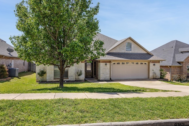 1625 Skidmore Ln, Tyler, TX 75703 - view of front facade with a garage, concrete driveway, roof with shingles, and a front yard