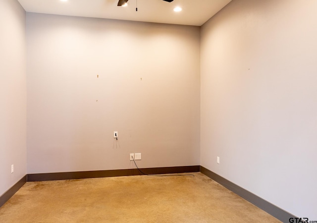 empty room featuring light carpet and ceiling fan