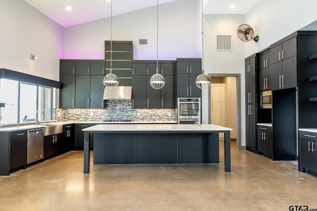 kitchen featuring dishwasher, high vaulted ceiling, decorative backsplash, and a center island