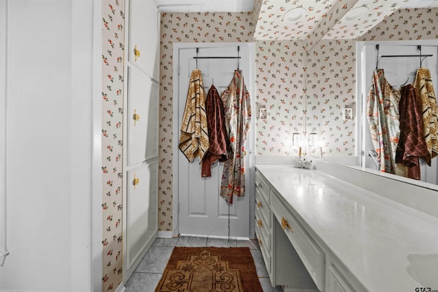 bathroom featuring tile patterned floors and vanity