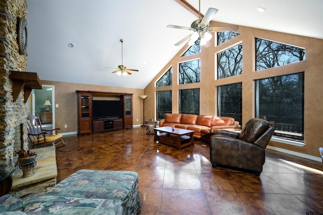151 Green Mesa Ln, Holly Lake Ranch, TX 75765 - living area featuring tile patterned flooring, a ceiling fan, baseboards, and high vaulted ceiling