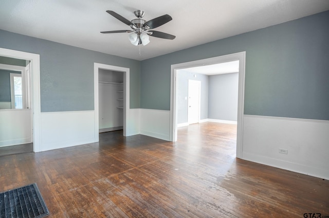 701 W Houston St, Tyler, TX 75702 - spare room with ceiling fan, wood finished floors, and baseboards