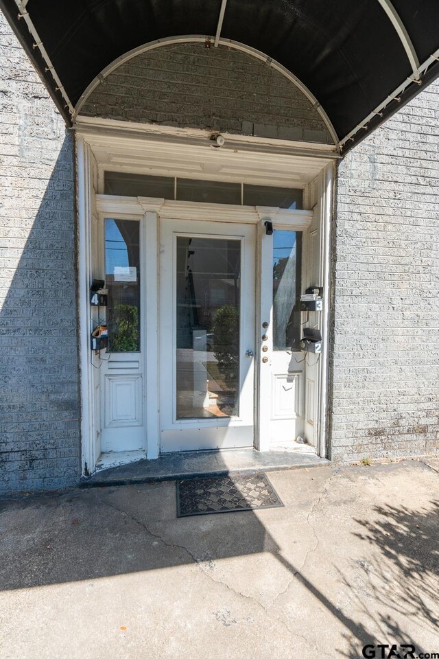 701 W Houston St, Tyler, TX 75702 - property entrance with brick siding