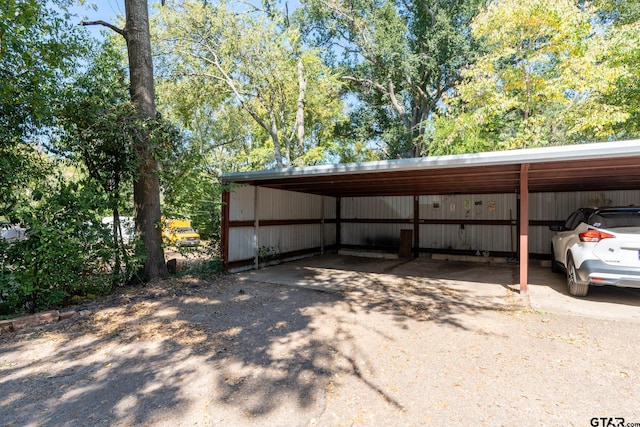 view of parking with a carport