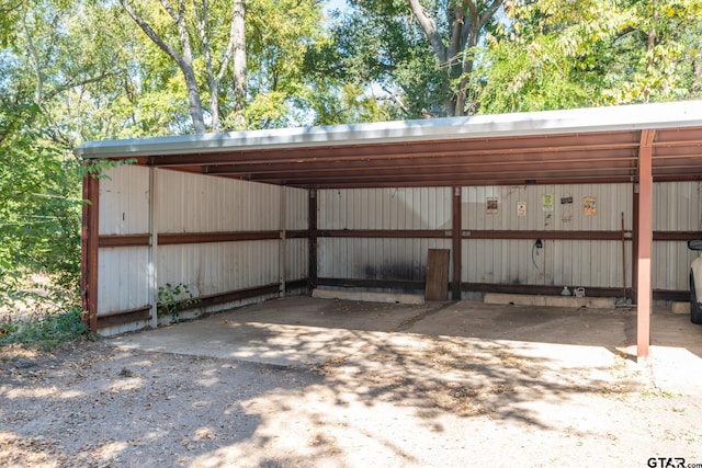 exterior space featuring a carport