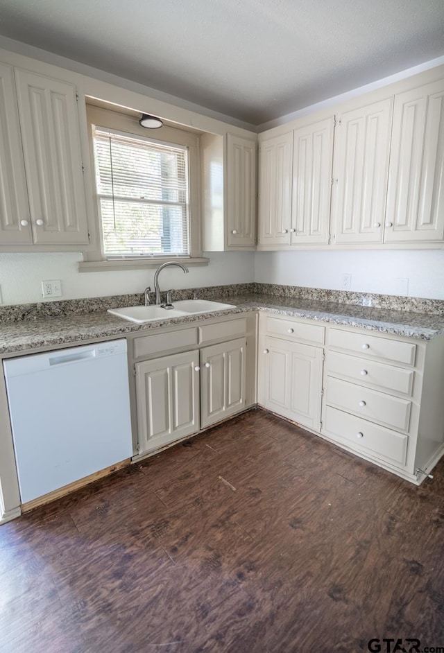 701 W Houston St, Tyler, TX 75702 - kitchen with a sink, white dishwasher, dark wood finished floors, and white cabinets