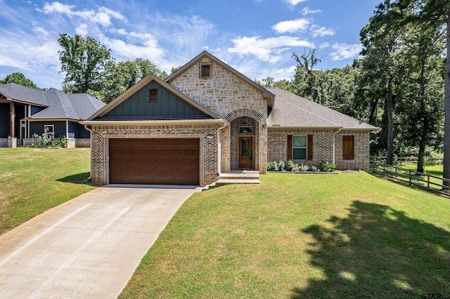 20851 Lakeview Dr, Flint, TX 75762 - view of front facade with a garage, concrete driveway, brick siding, and board and batten siding