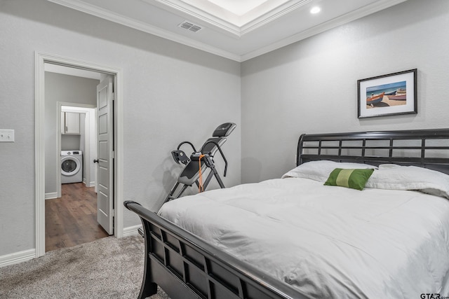 20851 Lakeview Dr, Flint, TX 75762 - bedroom featuring crown molding, washer / clothes dryer, and dark carpet