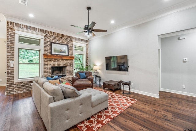 20851 Lakeview Dr, Flint, TX 75762 - living room featuring dark wood-style flooring, ceiling fan, crown molding, a fireplace, and recessed lighting