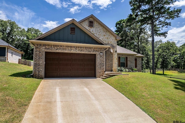 20851 Lakeview Dr, Flint, TX 75762 - view of front of house with driveway, brick siding, an attached garage, and board and batten siding