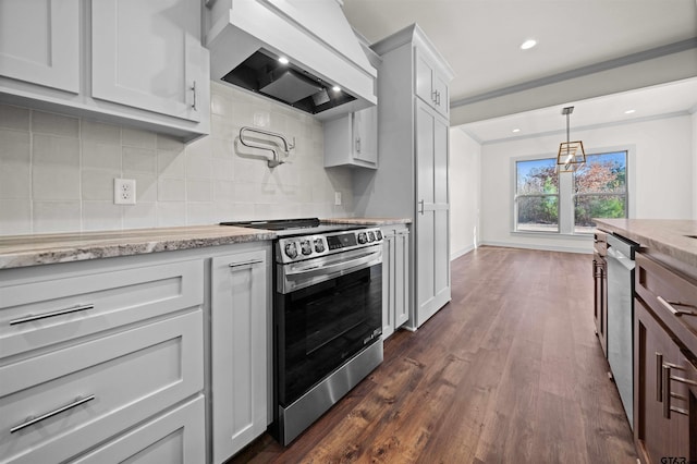 kitchen featuring custom exhaust hood, backsplash, white cabinets, appliances with stainless steel finishes, and dark hardwood / wood-style flooring